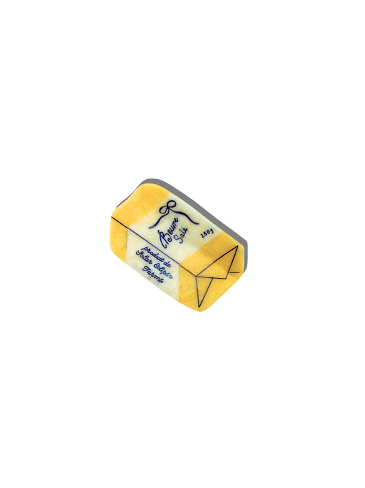 Solar Eclipse French butter claw clip: a yellow wrapped block of butter