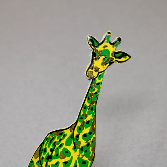 Yellow leather giraffe bookmark with green patches