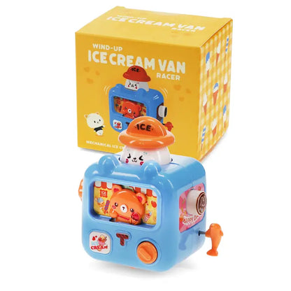Rex wind-up ice cream van toy beside its box