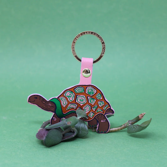Ark pink tortoise leather key fob with a patterned shell