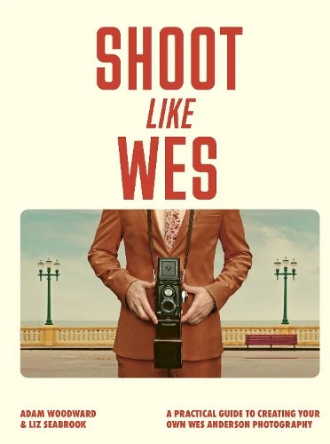 Shoot Like Wes by Adam Woodward and Liz Seabrook: a man in a brown suit holding a camera
