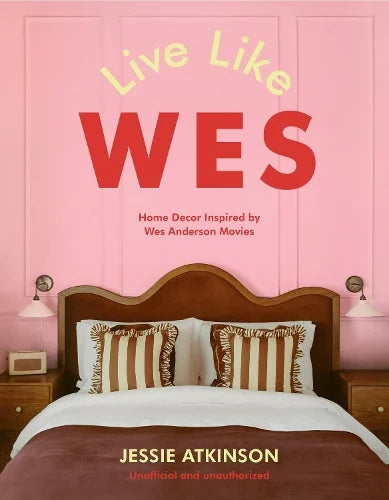 Live Like Wes by Jessie Atkinson: pink cover with a symmetrical bedroom of striped pillows, 'Home decor inspired by Wes Anderson movies'