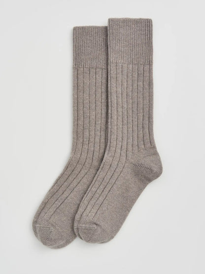 Pair of grey ribbed bed socks laid flat