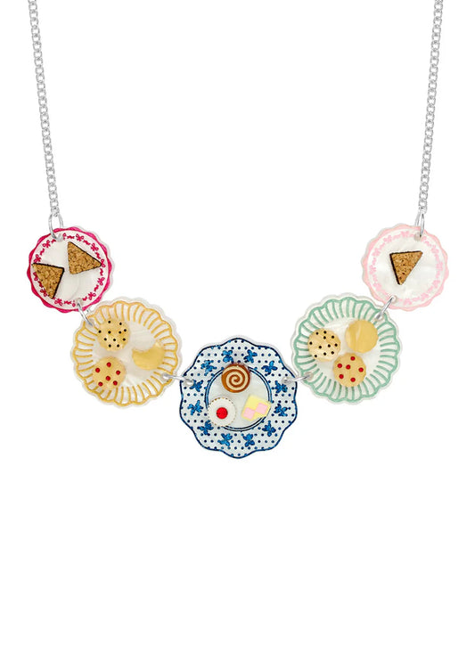 Tatty Devine afternoon tea necklace: plates of cakes and biscuits on a silver chain