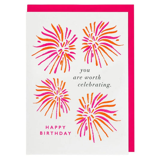 White card with pink and orange fireworks: you are worth celebrating. Happy birthday