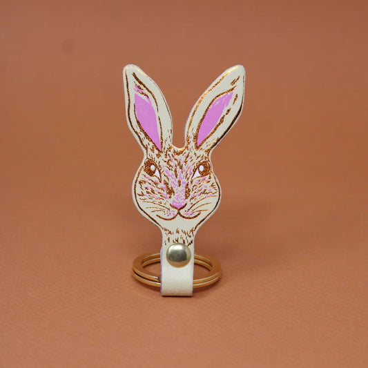 Cream leather rabbit head key fob with pink ears and copper details