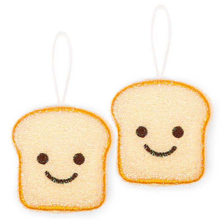 Two toast-shaped scrub sponges with smiley faces