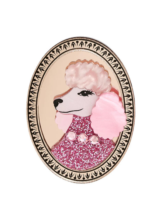 Tatty Devine cameo poodle brooch: a pink poodle with a glitter collar in a gold oval frame