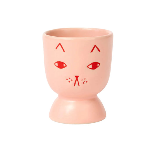 Donna Wilson peach egg cup with a cat face