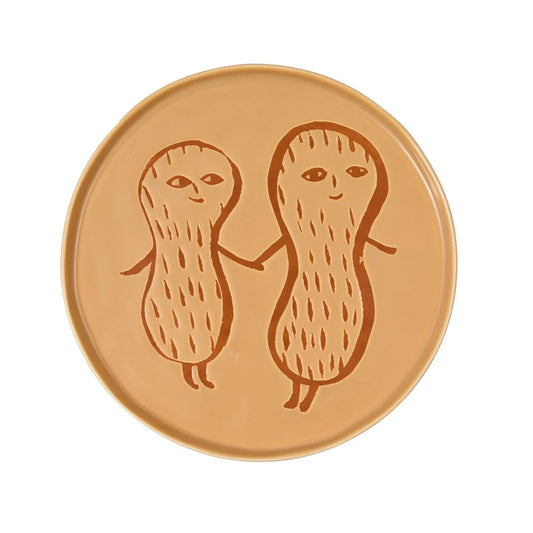 Donna Wilson tan plate with two peanut characters holding hands