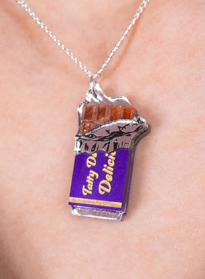 Chocolate bar pendant worn on a chain