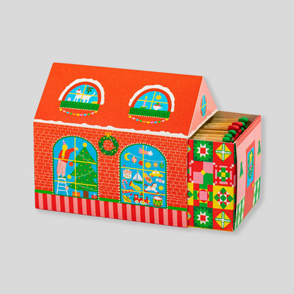 Archivist Christmas House matches shaped like a red brick house with a tree in the window