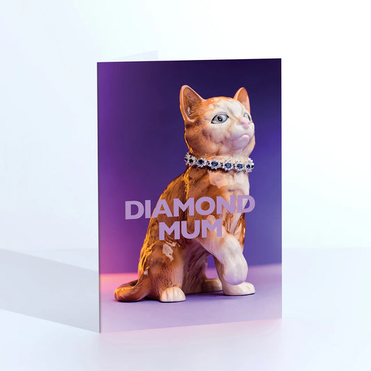 Ornament card: a ginger cat figurine with a diamond collar, with 'Diamond mum' on purple