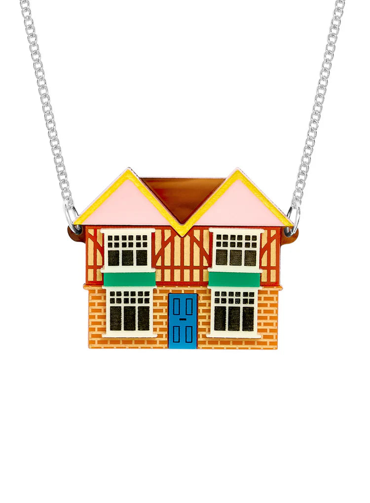Tatty Devine dolls' house necklace: a mock-Tudor house with a blue door on a silver chain