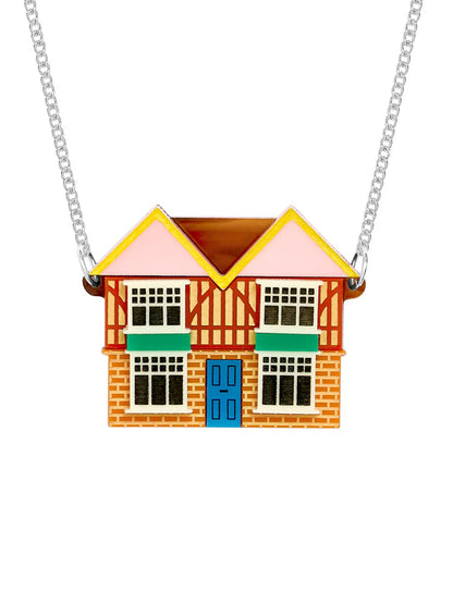 Tatty Devine dolls' house necklace: a mock-Tudor house with a blue door on a silver chain