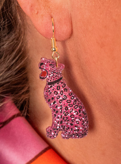 Pink glitter leopard earring worn