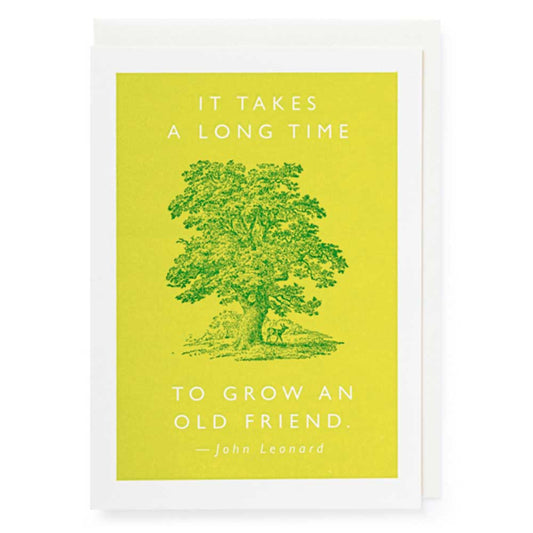 Archivist letterpress card: a green tree on lime, with 'It takes a long time to grow an old friend'