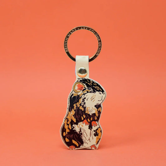Ark cream leather guinea pig key ring with a printed tortoiseshell guinea pig