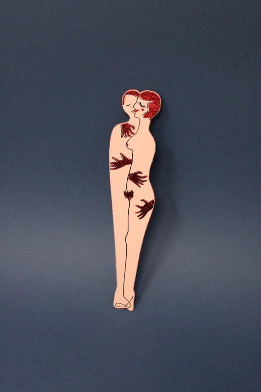 Pale pink leather bookmark of a nude woman with hands covering her