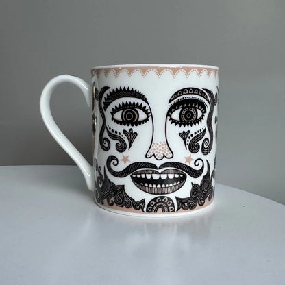 Lush Designs Moustache mug: a black and gold face with a big moustache and beard