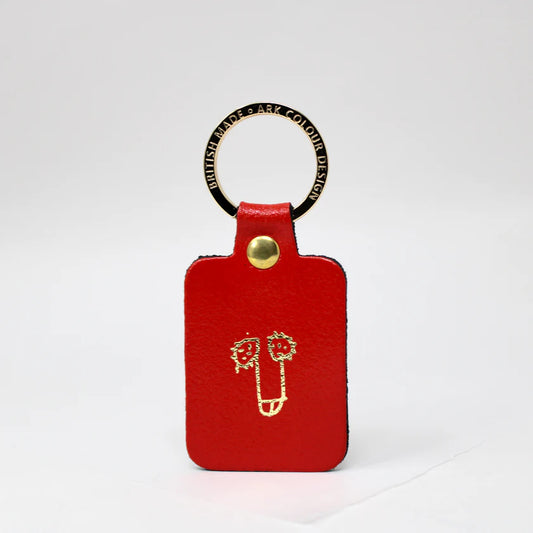 Ark red leather key fob with a gold-printed cheeky doodle