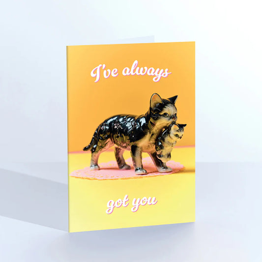 Ornament card: a tabby mother cat figurine with a kitten, with 'I've always got you' on yellow