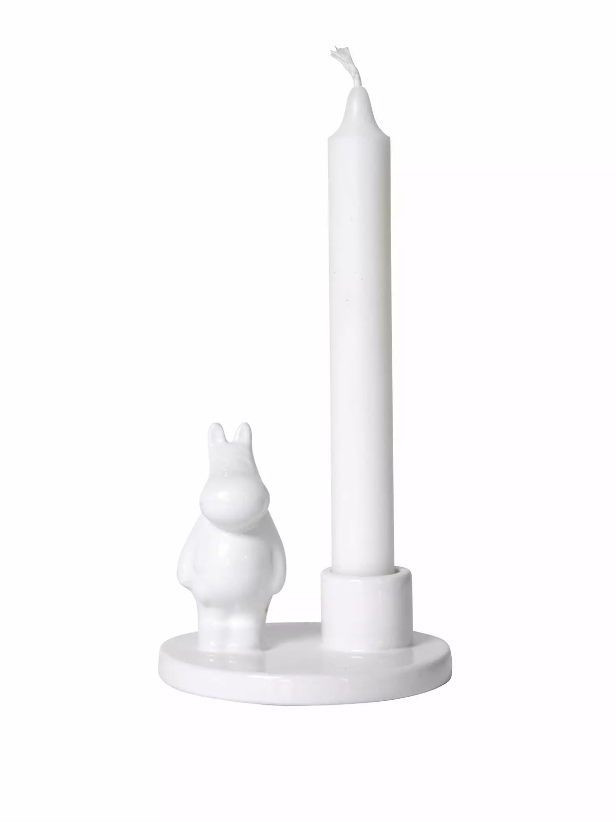 White porcelain candle holder with a small Moomintroll figure and a white candle