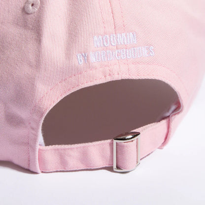 Back of the pink cap with 'Moomin by Nordicbuddies' and a buckle strap