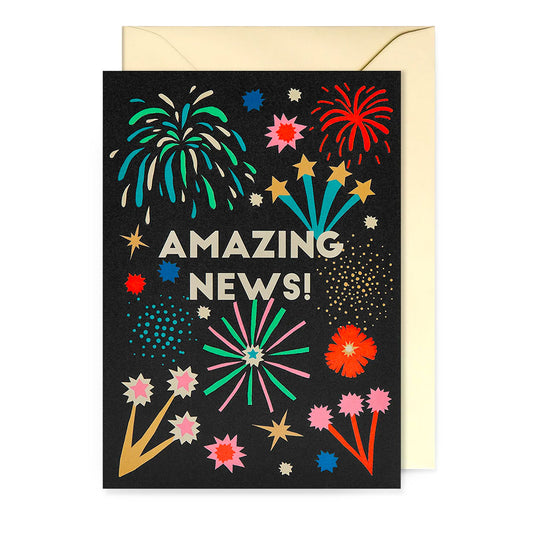 Lagom card: colourful fireworks on black, with 'Amazing news!'
