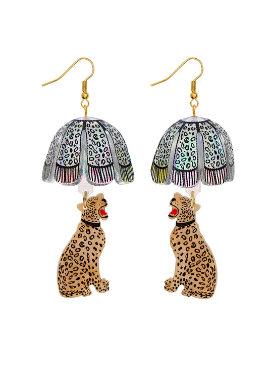 Tatty Devine Leopard Lamp Shade earrings: iridescent lampshades above sitting leopards