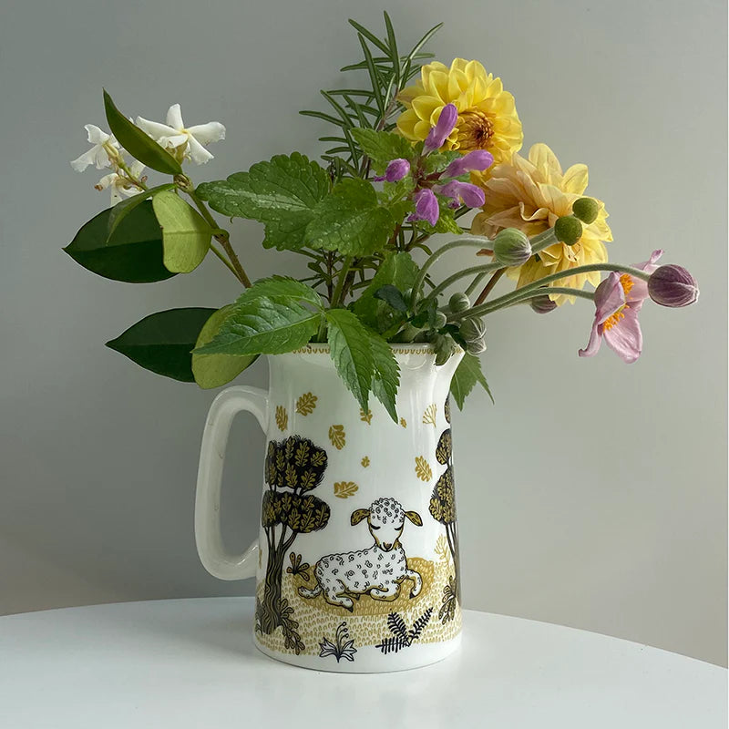 Lamb jug used as a vase for garden flowers