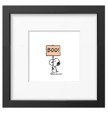 Framed Peanuts print of Snoopy holding a sign saying Boo!