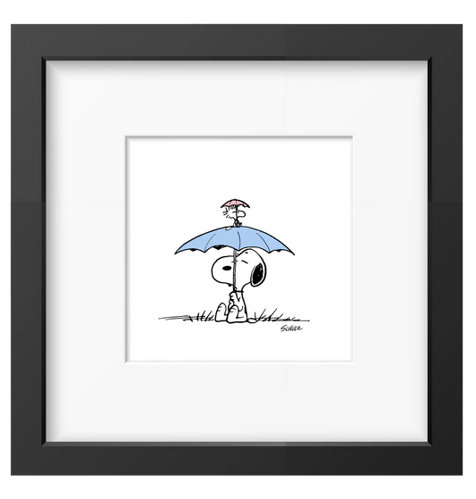 Peanuts framed print: Snoopy and Woodstock under a blue umbrella, in a black frame