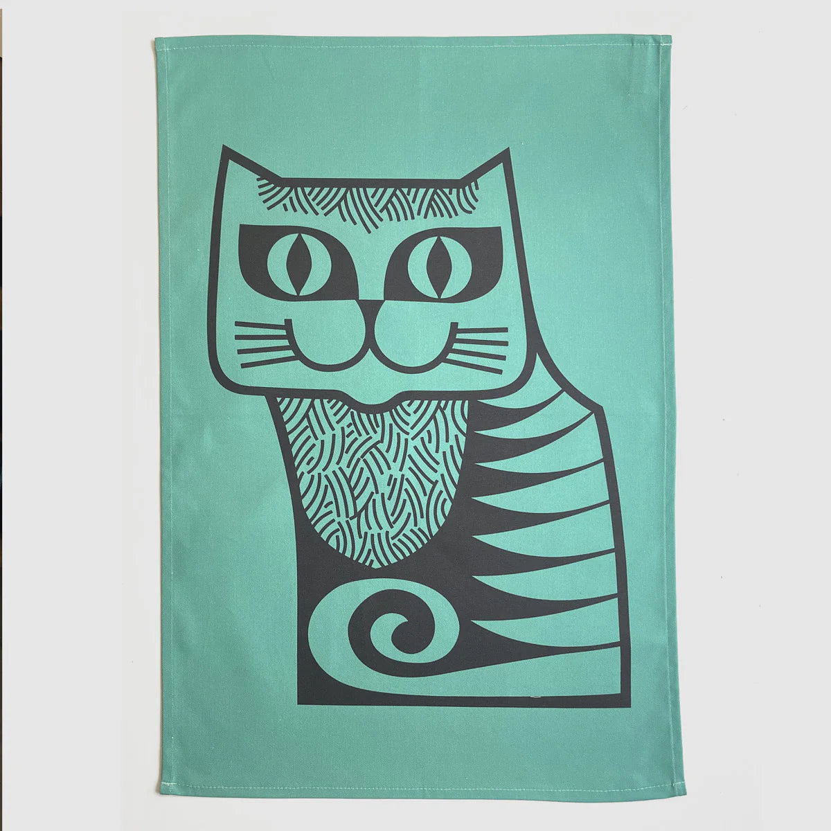Teal tea towel with a large black folk-style cat