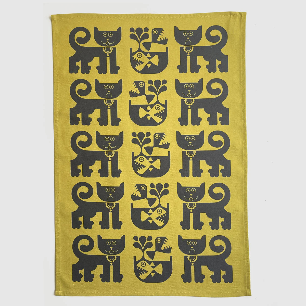Magpie x Hornsea gold tea towel with a pattern of black cats and piranhas