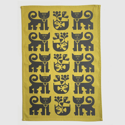 Magpie x Hornsea gold tea towel with a pattern of black cats and piranhas