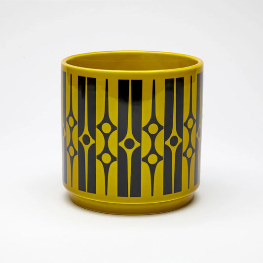 Magpie x Hornsea medium planter in chartreuse with a black geometric pattern