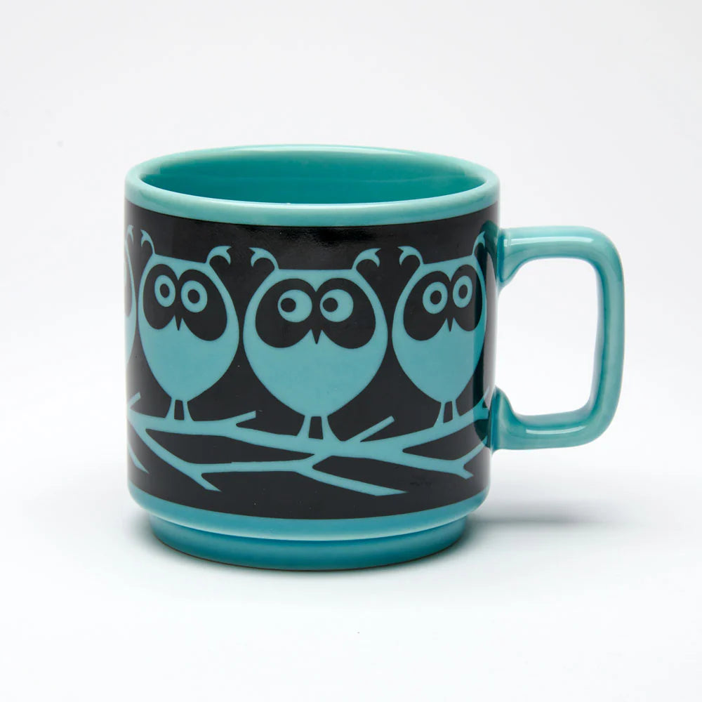 Magpie x Hornsea teal mug with a black band of teal owls on a branch