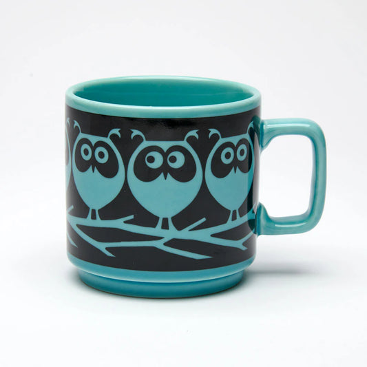 Magpie x Hornsea teal mug with a black band of teal owls on a branch