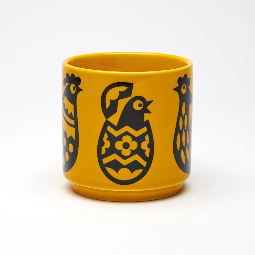 Other side of the chicken mug with a chick hatching from an egg