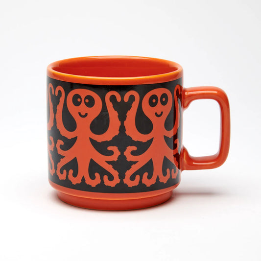 Magpie x Hornsea mug in orange with a black band of orange octopuses