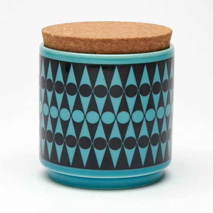 Teal and black backgammon pattern storage jar with a cork lid