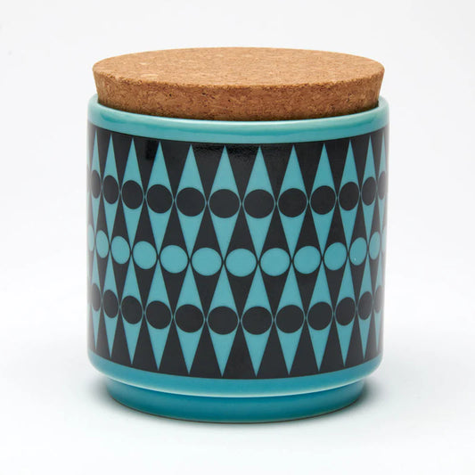 Teal and black backgammon pattern storage jar with a cork lid