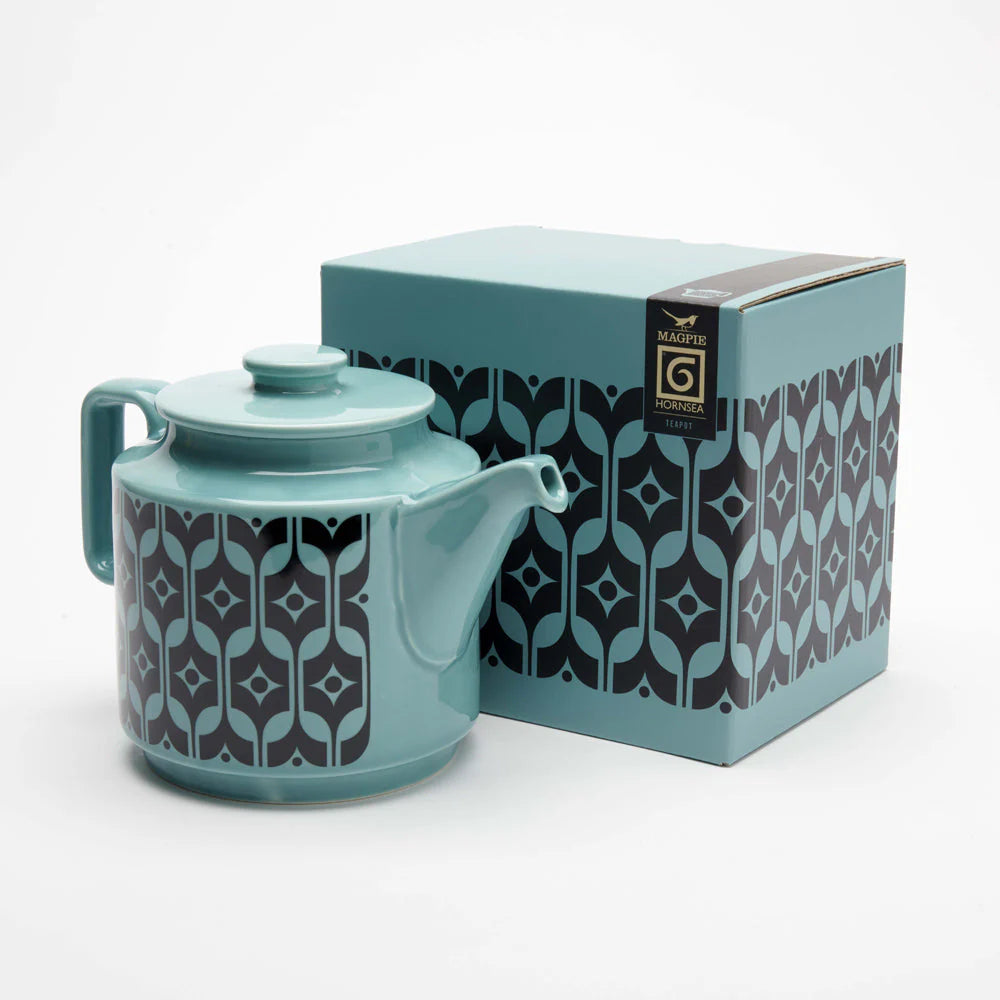 Blue Hornsea teapot beside its gift box