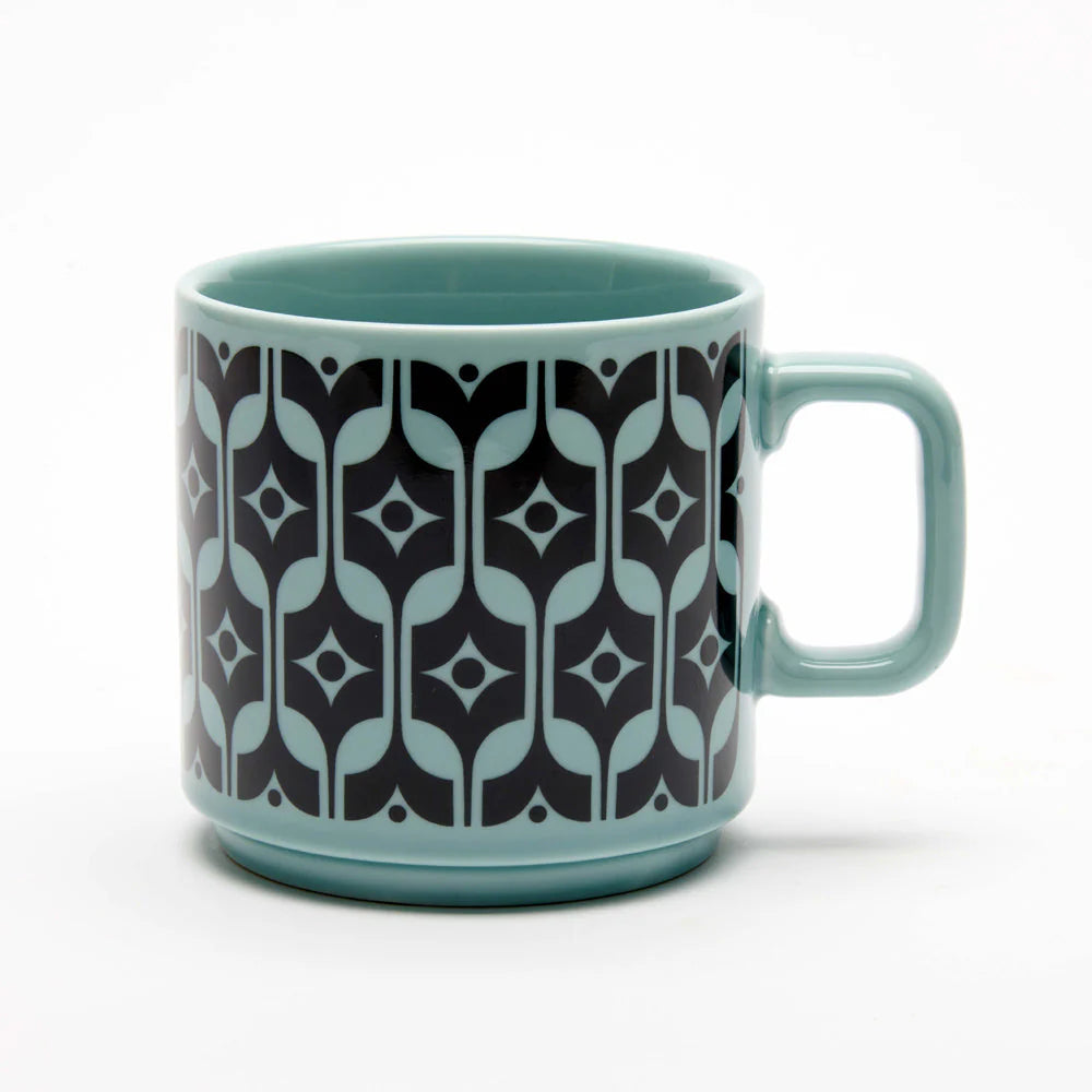 Magpie x Hornsea Heirloom mug in teal with a black geometric pattern