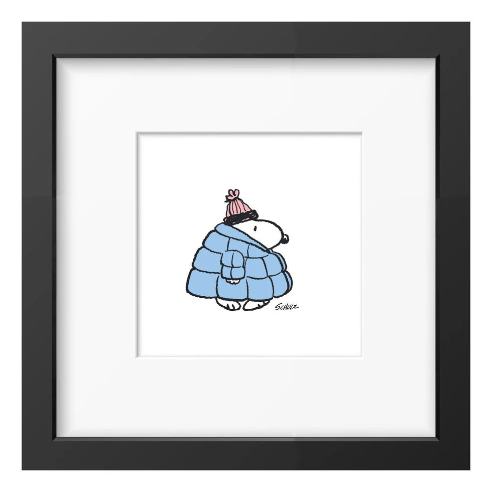 Peanuts framed print: Snoopy in a blue puffer coat and bobble hat, in a black frame
