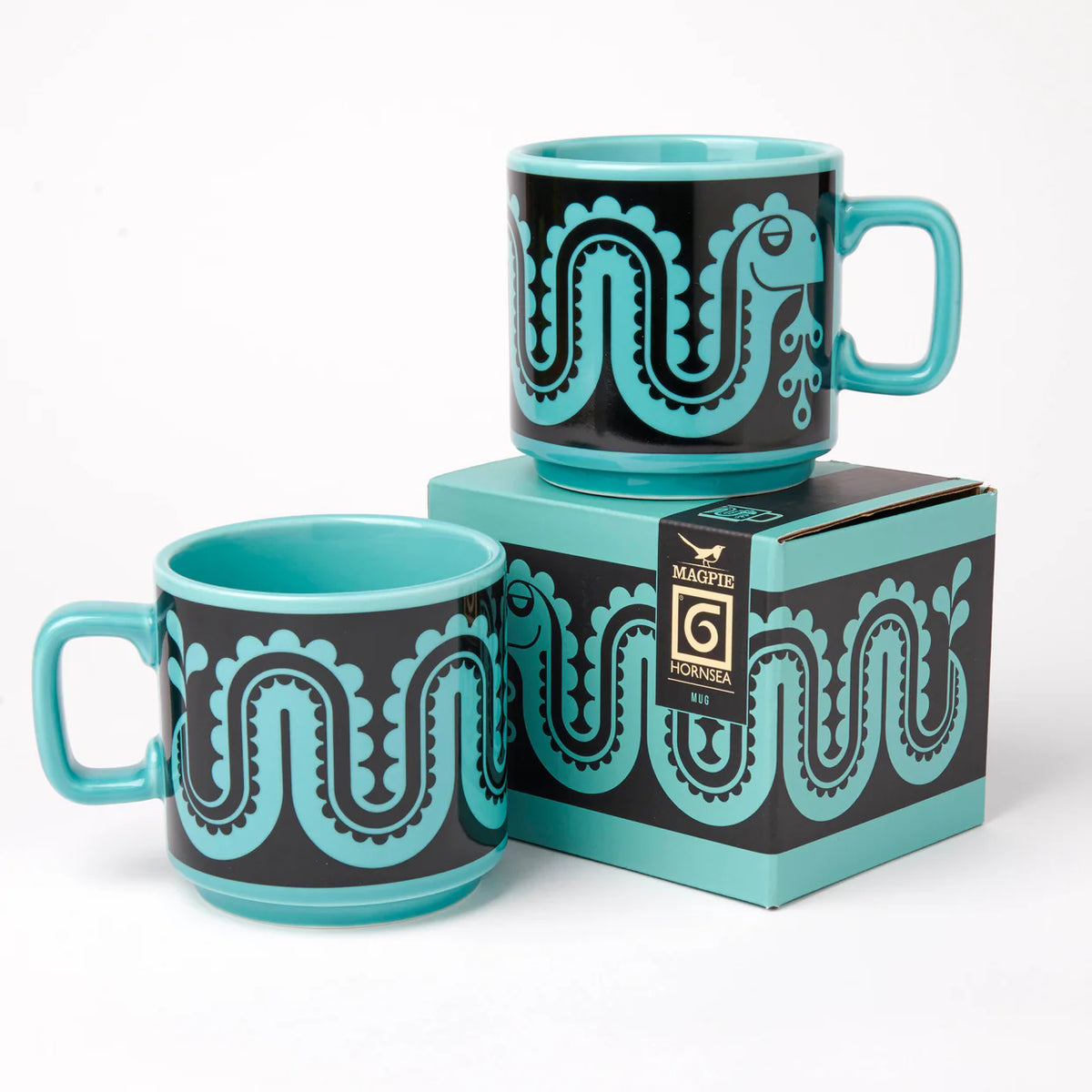 Two teal Nessie mugs with their gift box
