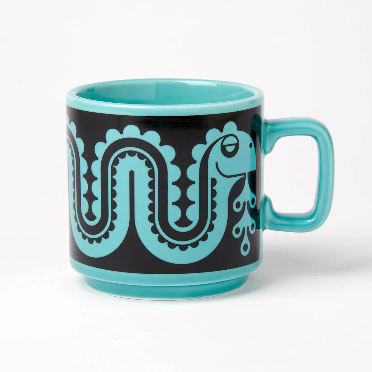 Magpie x Hornsea teal mug with a black band showing a teal Loch Ness monster