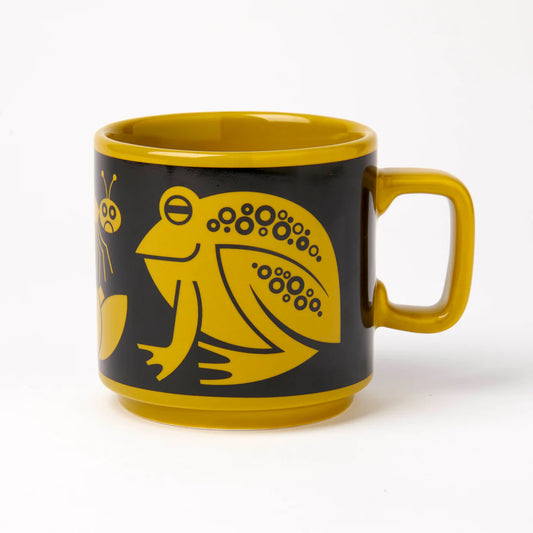 Magpie x Hornsea mug in chartreuse with a black band showing a frog