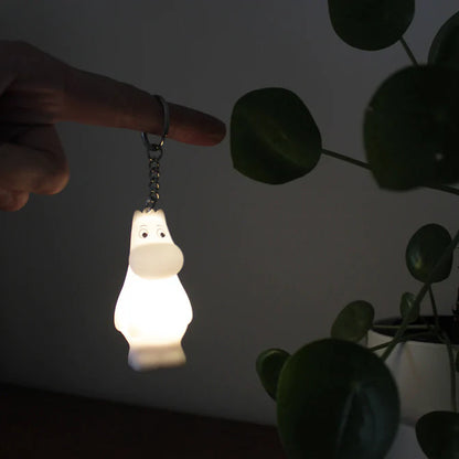 Moomintroll light-up key ring glowing in the dark